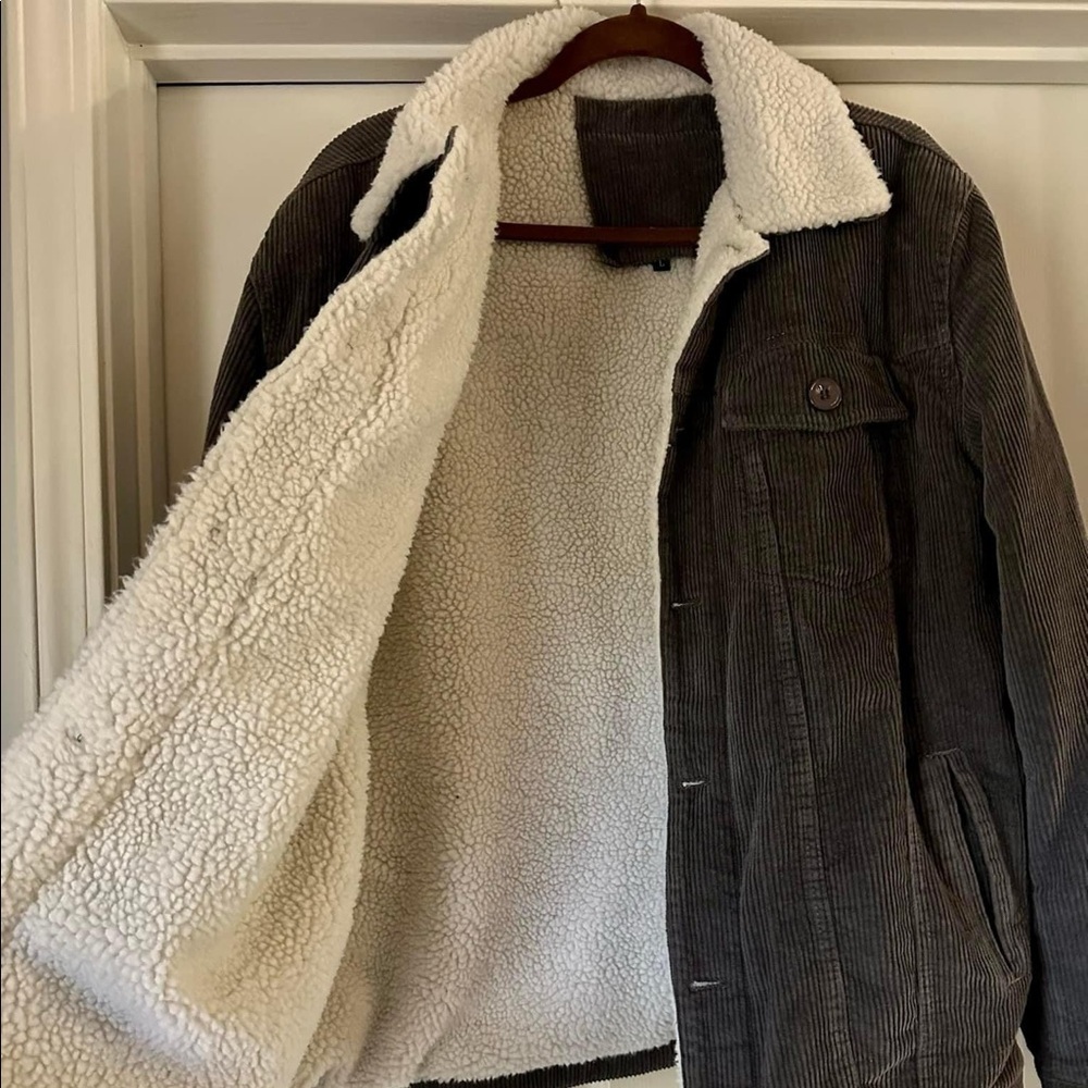Men’s large jacket. New! Buttons and pockets. Corduroy with Sherpa lining.